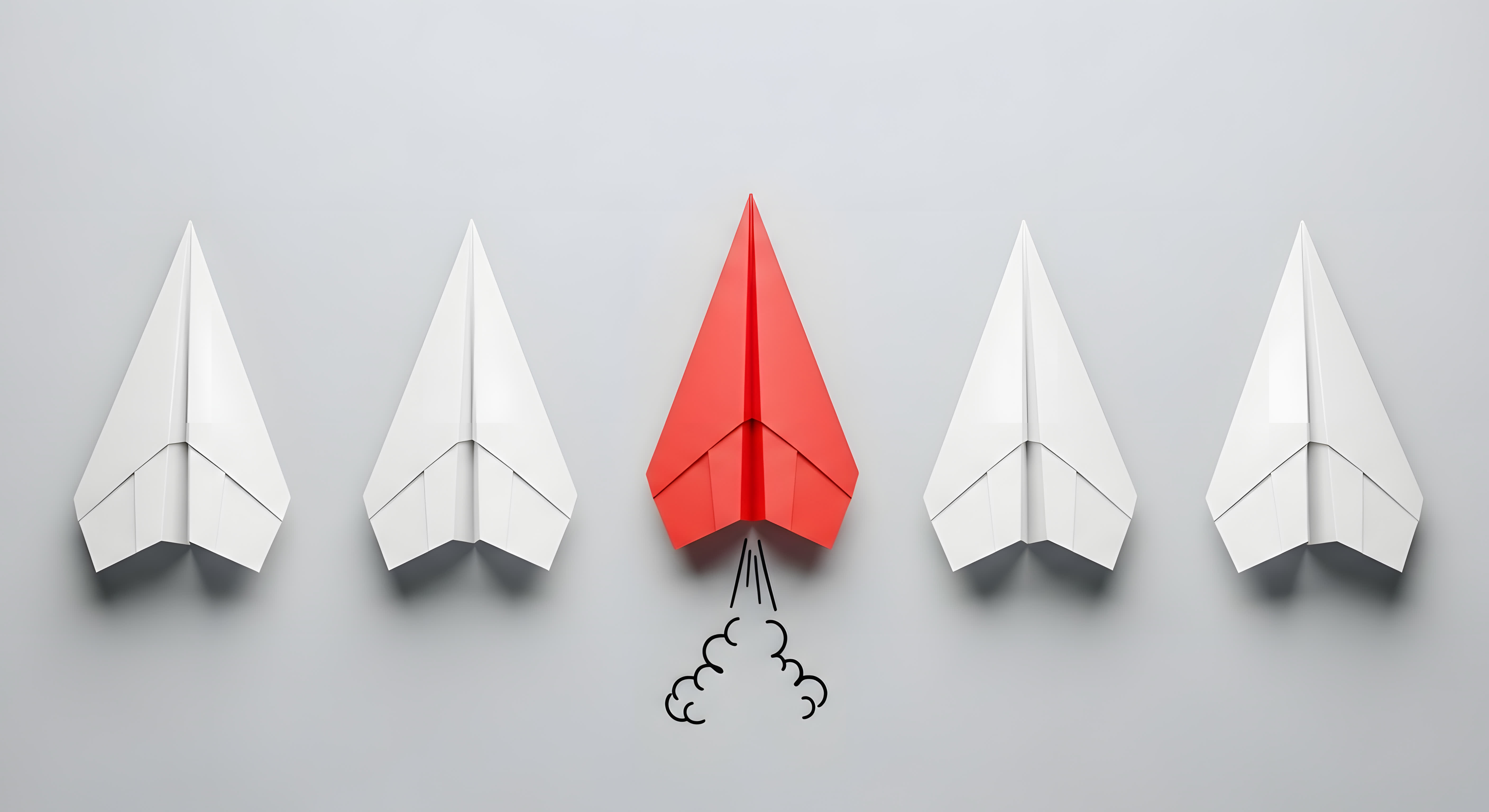Paper planes representing forward-thinking leadership and professional skills